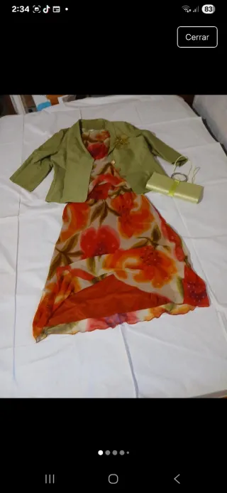 Conjunto chaqueta, falda,blusa y bolso