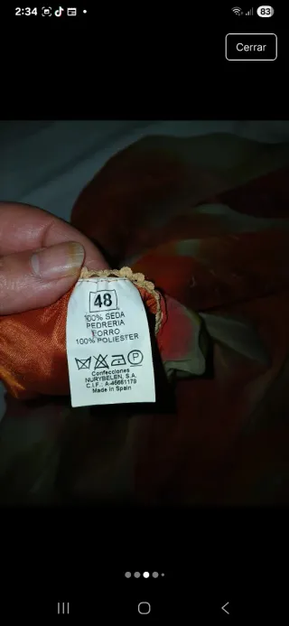 Conjunto chaqueta, falda,blusa y bolso