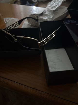 Occhiali da sole Versace dorati e neri