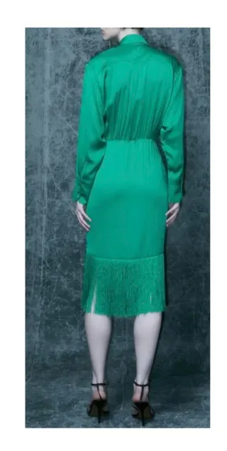 Vestido camisero con flecos