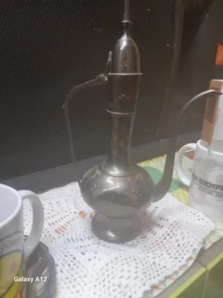 Canejo antiguo de metal