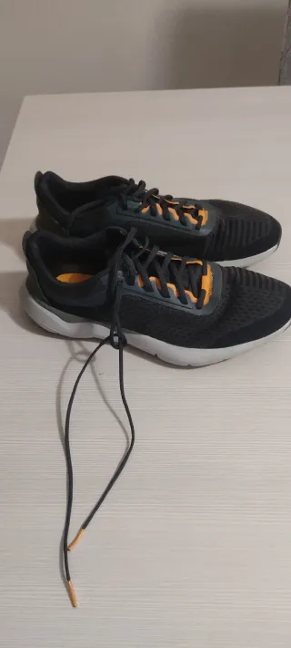 Scarpe running Kalenji nere e arancioni