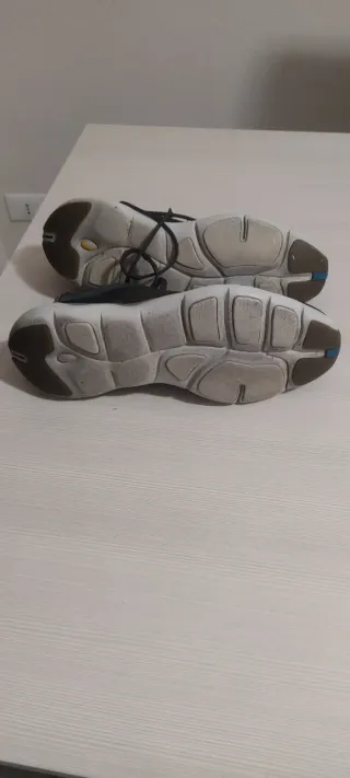 Scarpe running Kalenji nere e arancioni