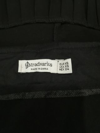 Minifalda negra plisada