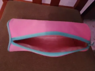 Estuche rosa con símbolo OK