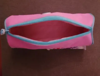 Estuche rosa con símbolo OK