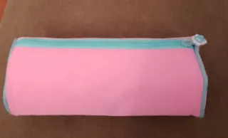 Estuche rosa con símbolo OK