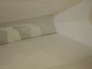 Borsa boutique Prada, bianca e altre due