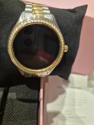 Reloj Tous bicolor con pedrería