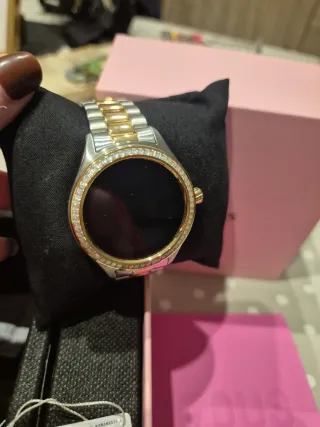 Reloj Tous bicolor con pedrería