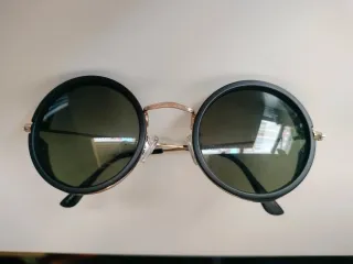 Occhiali da sole rotondi neri e dorati