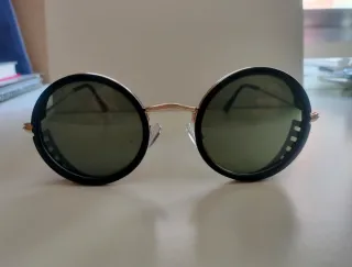 Occhiali da sole rotondi neri e dorati