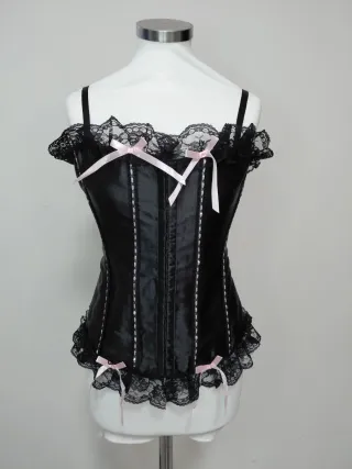 Bustino nero con pizzo e fiocchi rosa