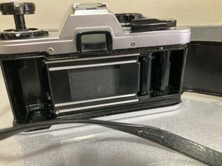 Olympus OM10 Cámara Analógica Plata y Negra