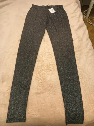 Mallas brillantes plateadas y negras