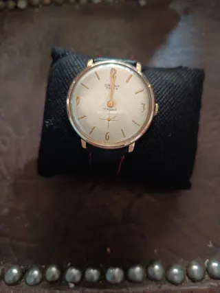 Reloj Cauny Dorado . Años 50-60