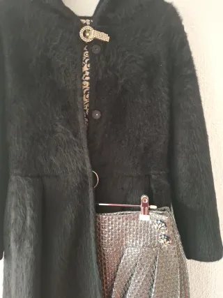 Conjunto fiesta falda plateada y abrigo negro