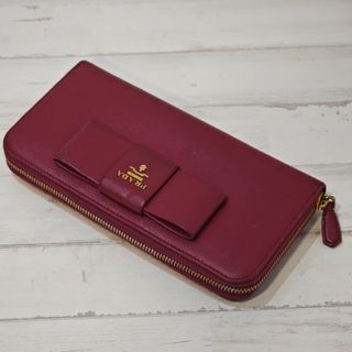 Borsa lunga Prada rossa con fiocco