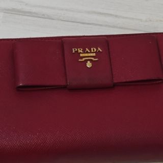 Borsa lunga Prada rossa con fiocco