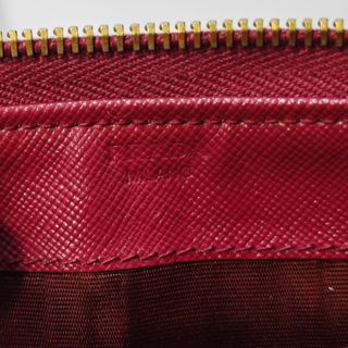 Borsa lunga Prada rossa con fiocco