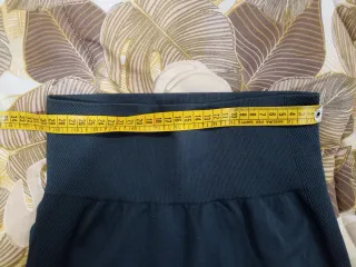 Pantacollant grigio scuro.