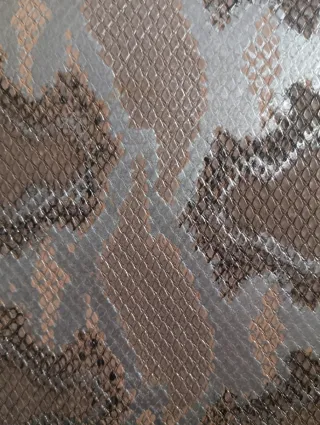 Bolso bandolera beige y dorado