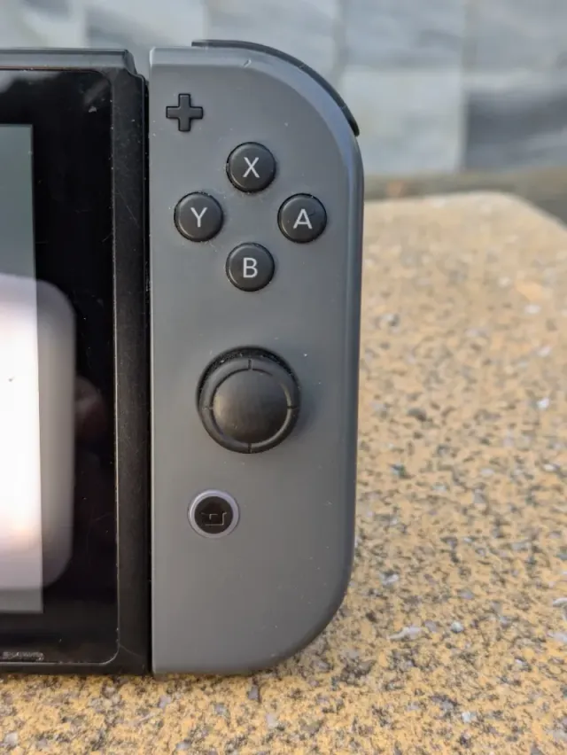 Nintendo Switch Gris COMPLETA + Funda+ Juego