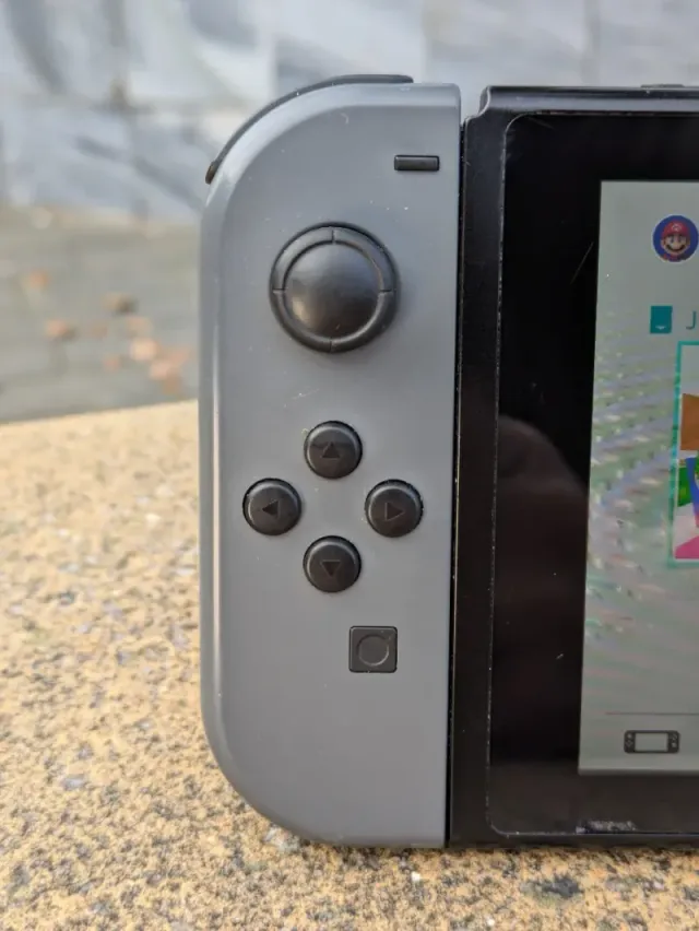 Nintendo Switch Gris COMPLETA + Funda+ Juego