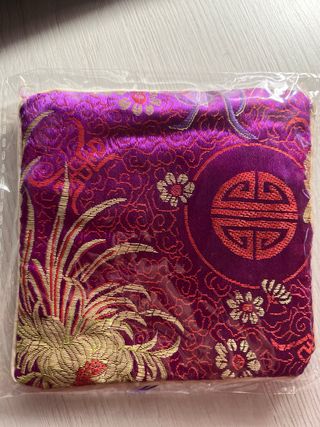 Monedero estilo oriental con borla