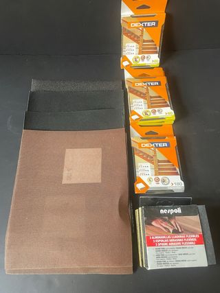 Lijadora eléctrica y manual roja y accesorios.