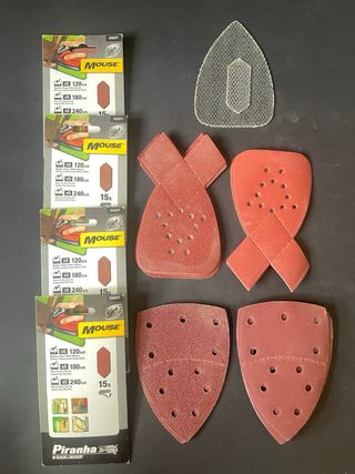 Lijadora eléctrica y manual roja y accesorios.