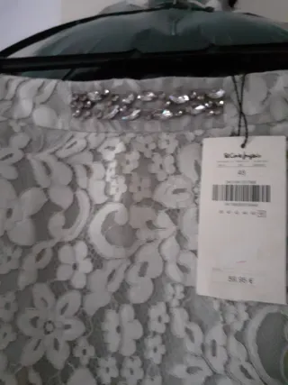 51cm de cintura y 64cm de largo Nueva con etiquet