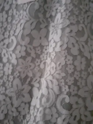 51cm de cintura y 64cm de largo Nueva con etiquet