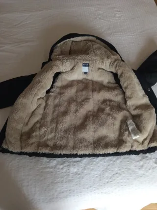 Giubbotto nero per bambini con fodera in pelliccia