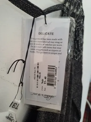 Mono corto fiesta lentejuelas negro