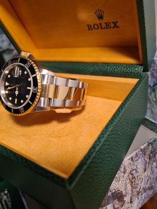 Rolex submariner acero y oro  negro