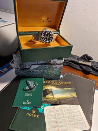Rolex submariner acero y oro  negro