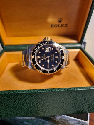 Rolex submariner acero y oro  negro
