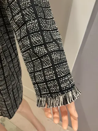 Chaqueta tres cuartos negra y plata