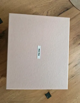 Scarpe Miu Miu in pelle bianche e argentate