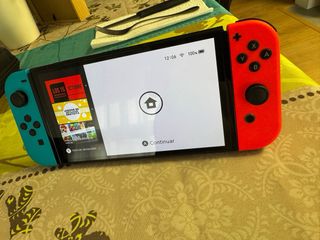 Nintendo Switch OLED Blu/Arancione