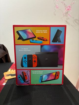 Nintendo Switch OLED Blu/Arancione