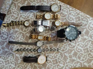 Lotto di 11 orologi di varie marche