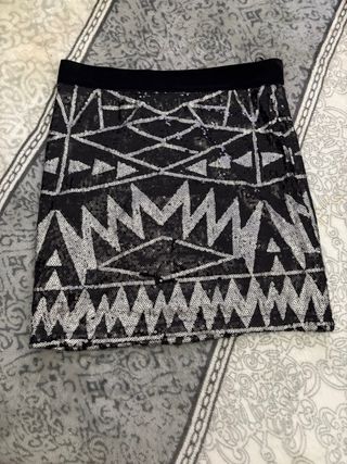 Falda corta lentejuelas plateadas