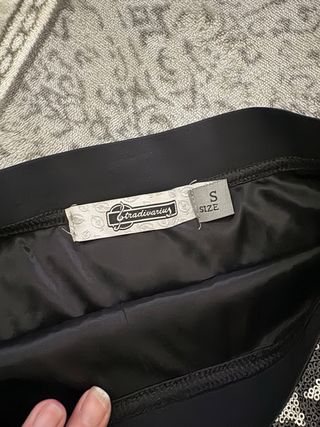 Falda corta lentejuelas plateadas