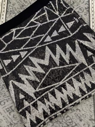 Falda corta lentejuelas plateadas