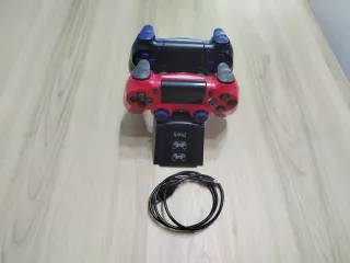 PS4 (PlayStation 4) + 2 Giochi + 2 Controller