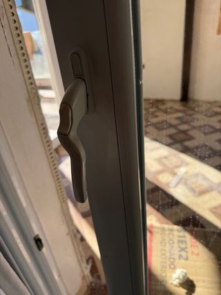 Puerta corredera acristalada