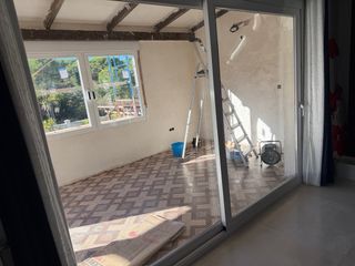 Puerta corredera acristalada