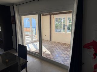 Puerta corredera acristalada